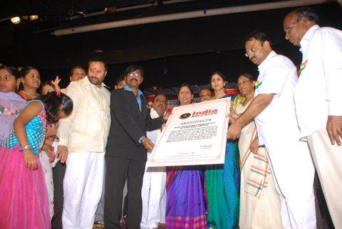 Receiving world record from the representative of India book of records