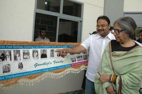 Tara Gandhi watching curiously the greeting card